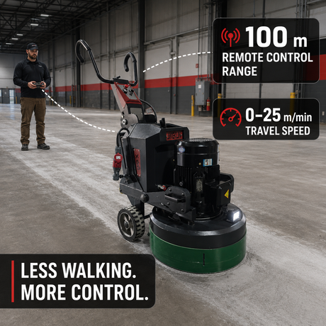 Operator using remote control with a planetary floor grinder