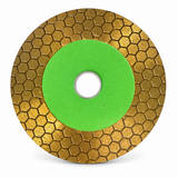 Reverse face of HUANG CHANG disc showing gold hexagonal pattern and green centre