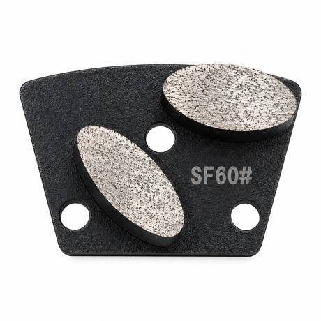 Black SF60 grinding shoe with two oval diamond segments, soft bond