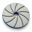 Grey resin diamond polishing wheel with curved grooves and a blue Snail Lock backing on white.