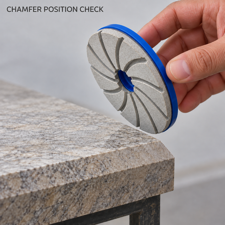 Illustration of a stationary wheel held near a stone chamfer for a position check.