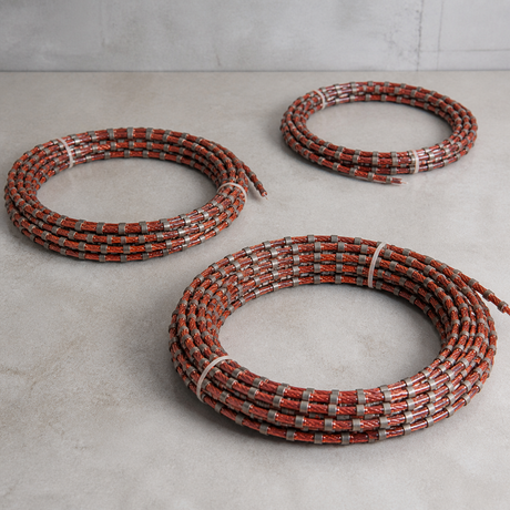 Rubber coated diamond wire saw rolls for quarry and construction cutting