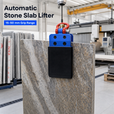 Automatic stone slab lifter with 15-50 mm grip range in stone workshop